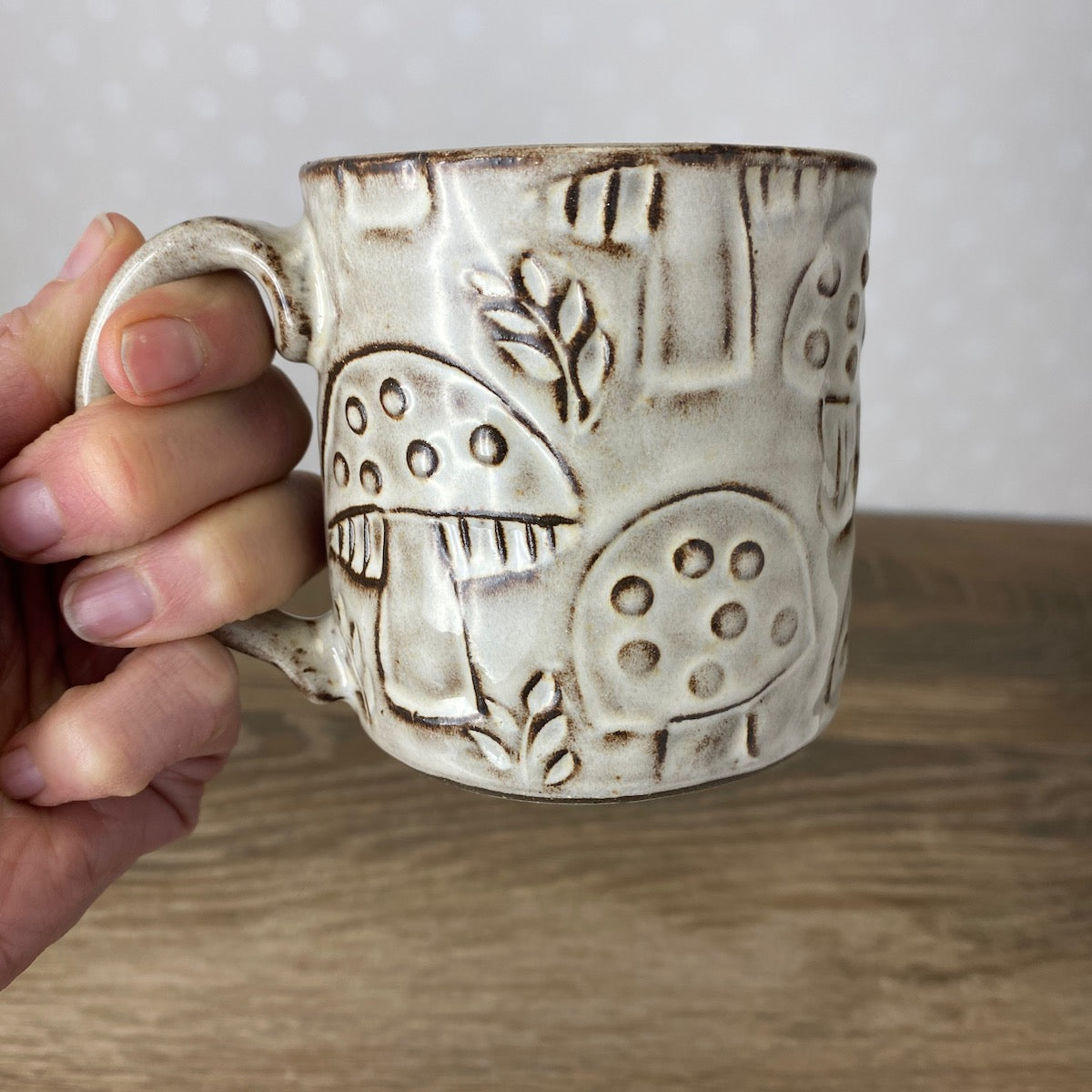 Textured Stoneware Coffee Mug with Mushrooms