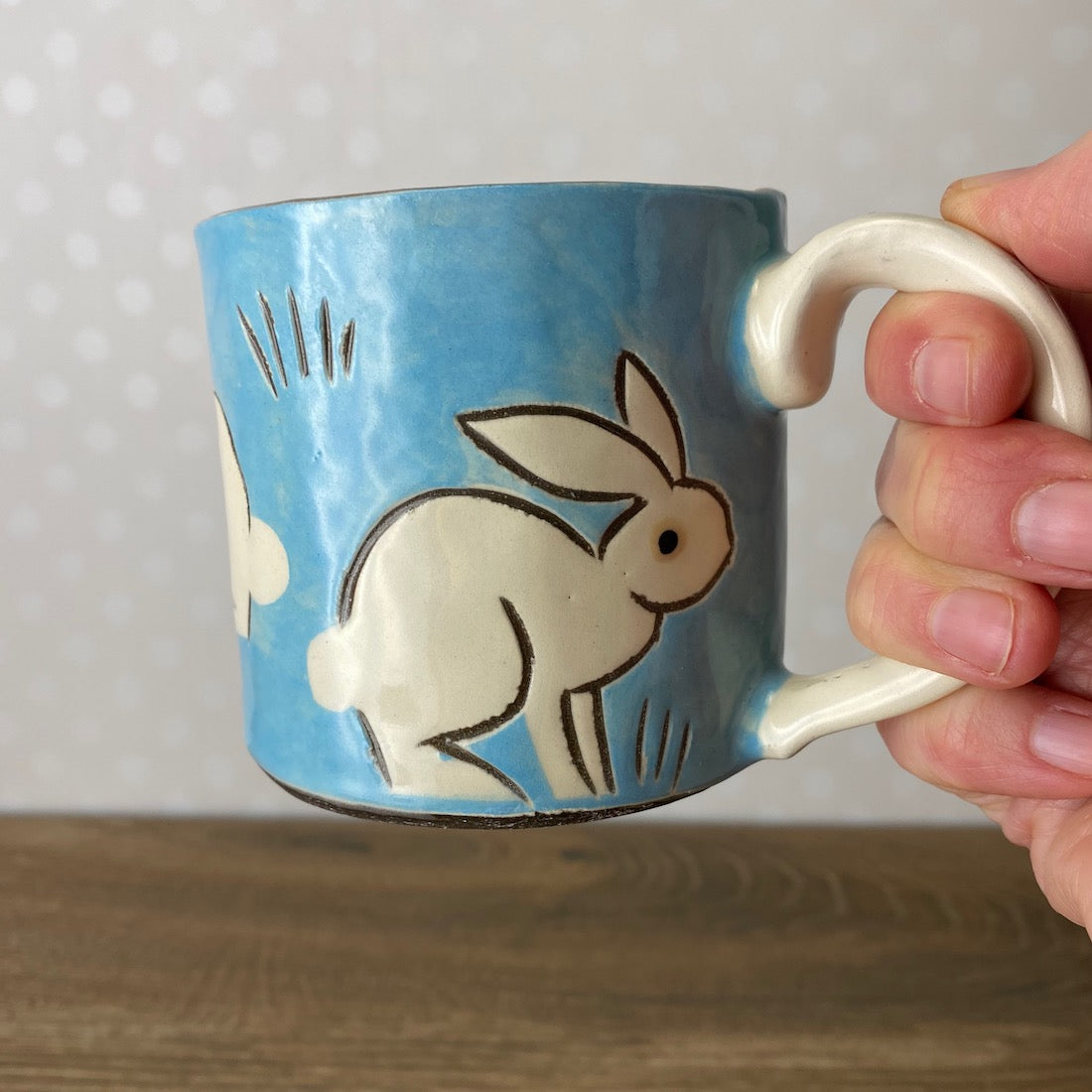 Charming Stoneware Mug with Rabbits